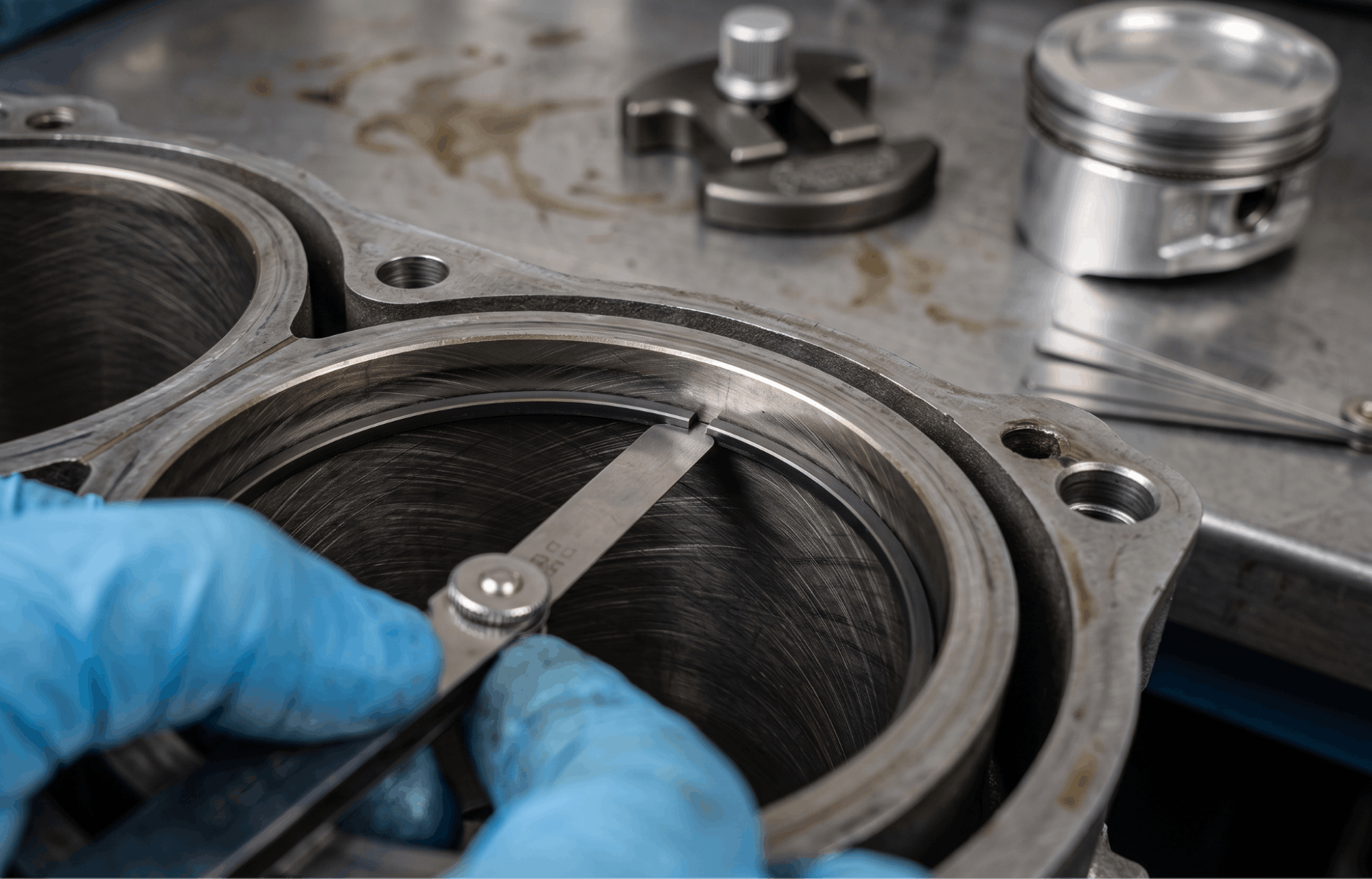 checking piston ring gap with feeler gauge